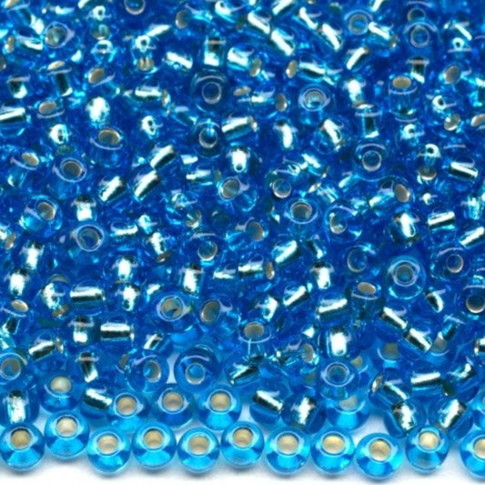 10/0 67030 Preciosa Czech Glass Perler Rocailles 2.3mm. Blå transparent sølvbelagt.