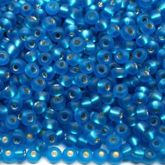 10/0 67150matte Preciosa čehu stikla Pērlītes Rokaja 2.3mm. Zils caurspīdīgs sudraba maliņa.