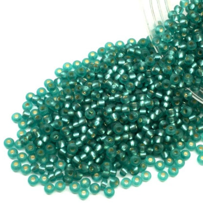 10/0 67210matte Preciosa Seed Beads. Blue Green transparent Silver lined.