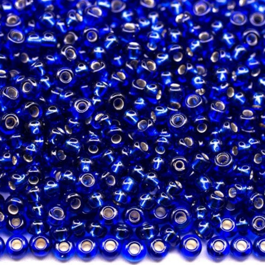 10/0 67300 Preciosa Czech Glass Perler Rocailles 2.3mm. Blå transparent sølvbelagt.