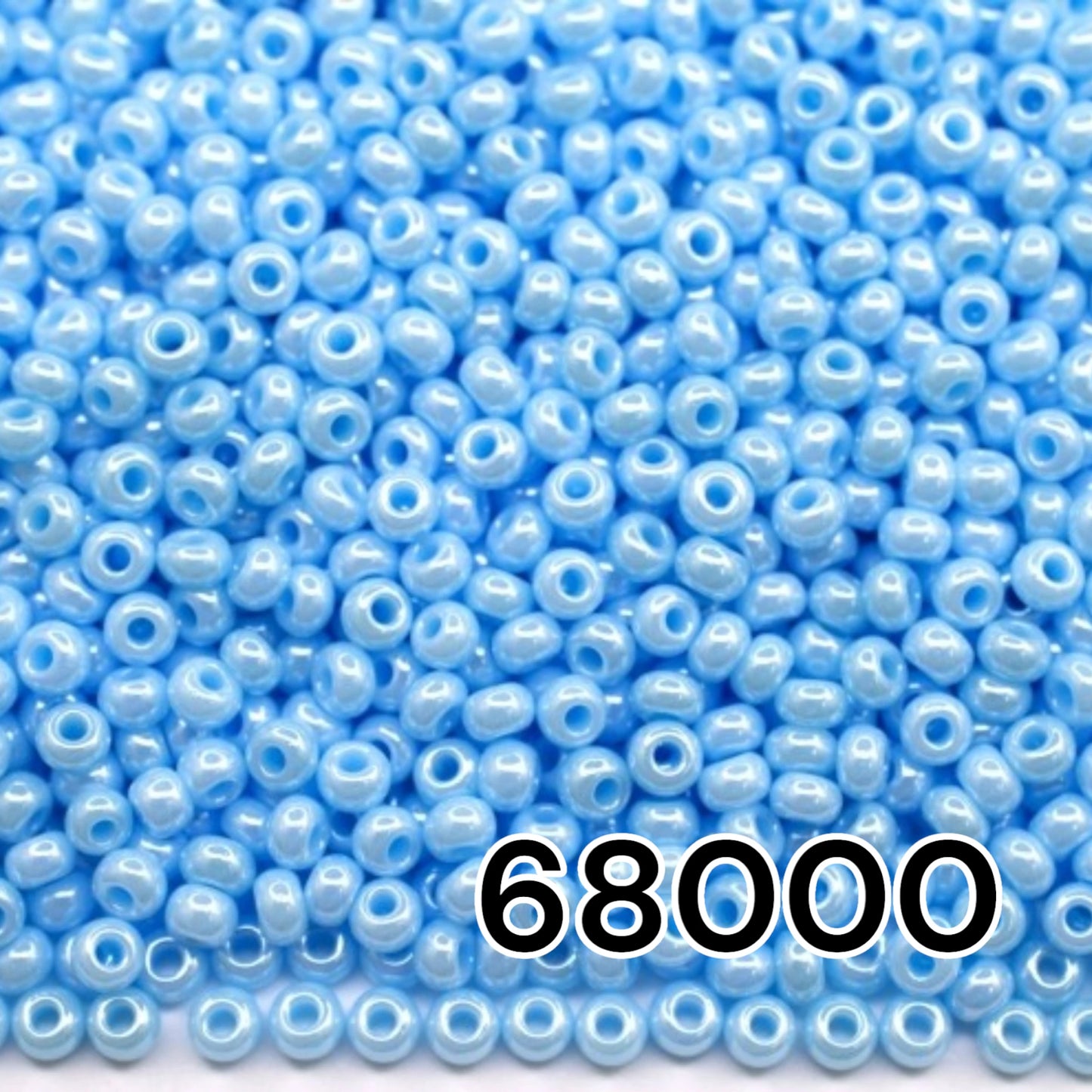 10/0 68000 Preciosa Seed Beads. Opaque Sfinx light blue.