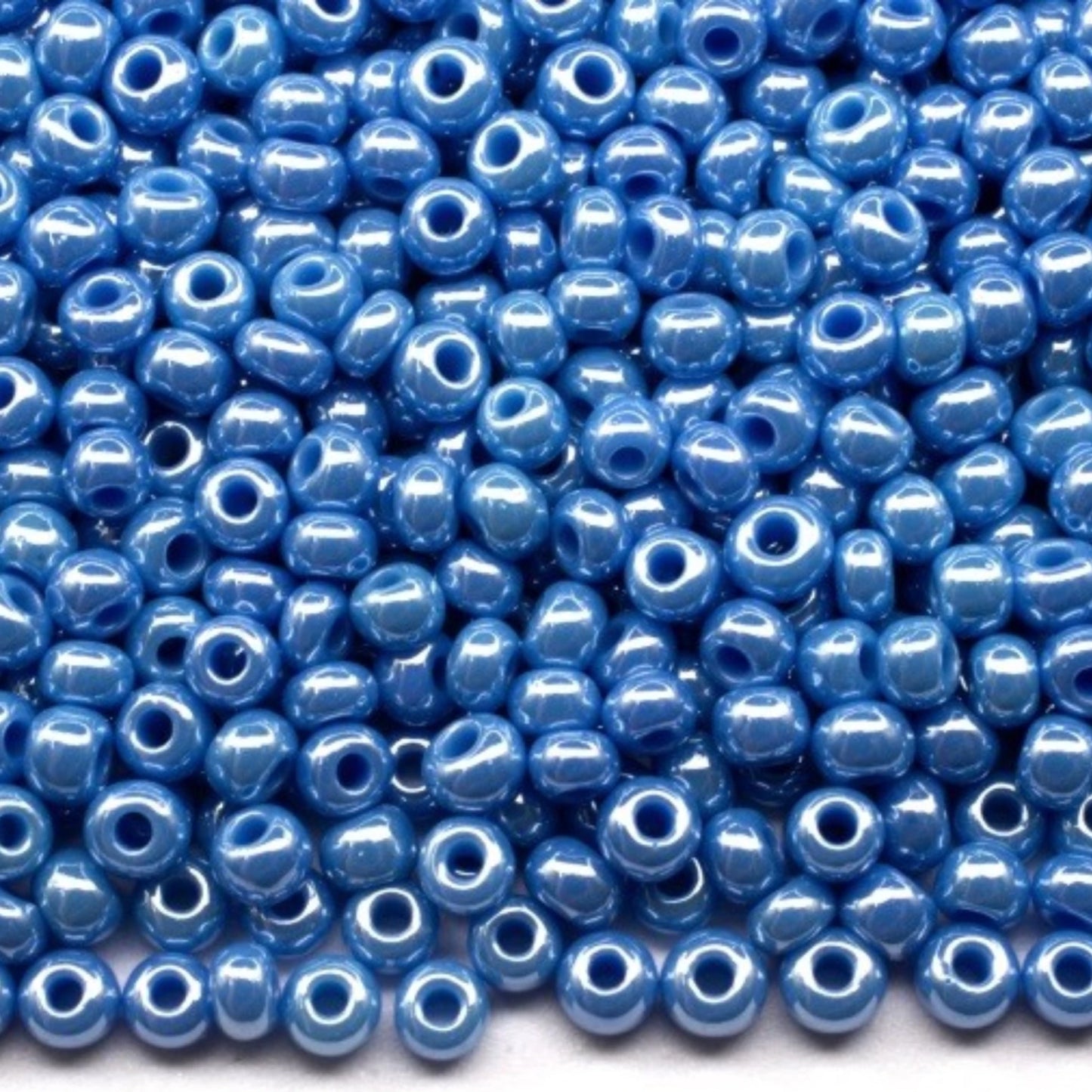 10/0 68080 Preciosa Seed Beads. Opaque Sfinx blue.