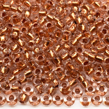 10/0 68105 Preciosa Tschechische Glasperlen Rocailles 2.3mm. Kristall, Kupfergefüttert Metallic.