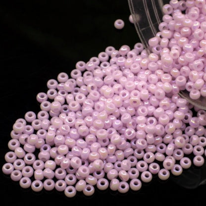 10/0 74420 Preciosa Seed Beads. Opaque rainbow pink.