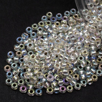10/0 78109 Preciosa Perles de verre tchèques de Rocaille 2.3mm. Cristal doublé argent, arc-en-ciel.