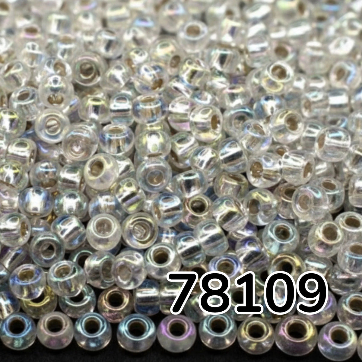 10/0 78109 Preciosa Perles de verre tchèques de Rocaille 2.3mm. Cristal doublé argent, arc-en-ciel.