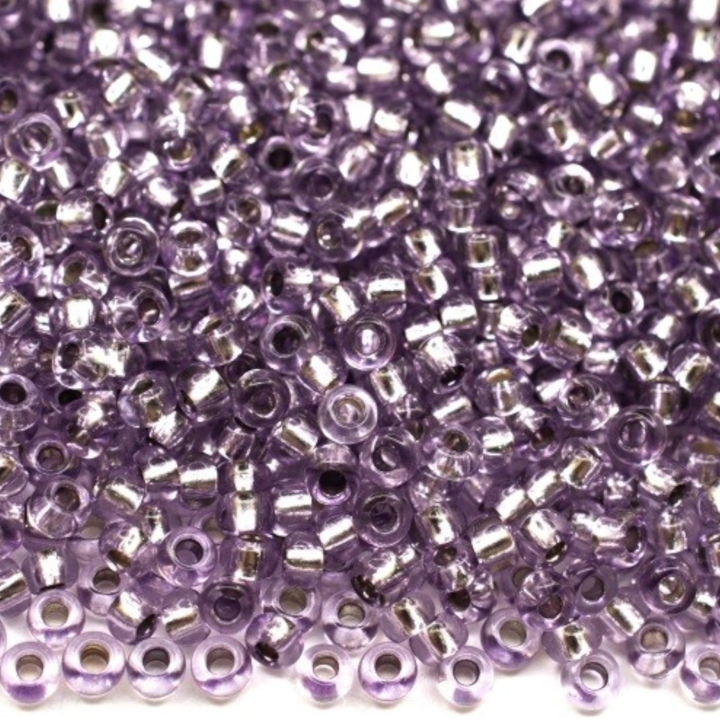 10/0 78122 Preciosa Czech Glass Koraliki Rocailles 2.3mm. Fioletowe 2 barwione Kryształ, Srebrna powłoka.