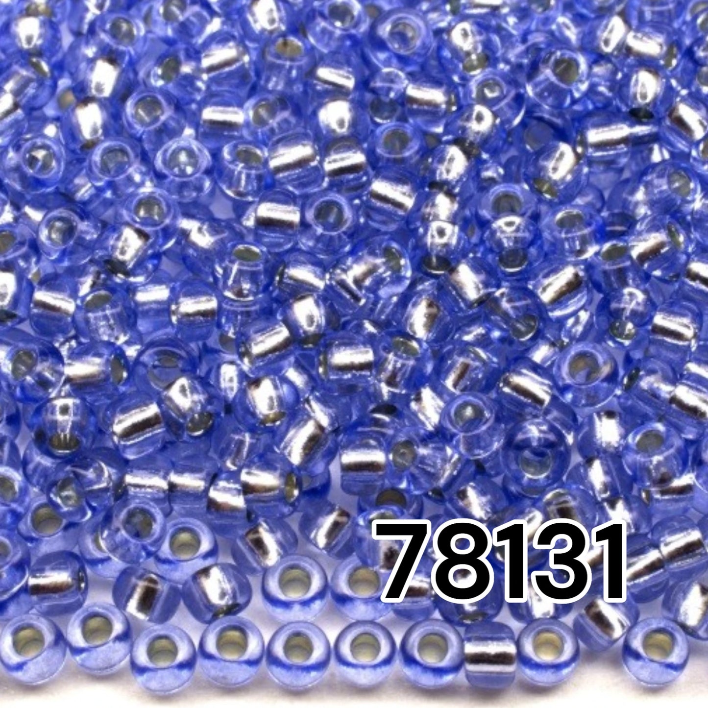 10/0 78131 Preciosa Czech Glass Seed Beads Rocailles 2.3mm. Blue 2 dyed Crystal, Silver Lined.