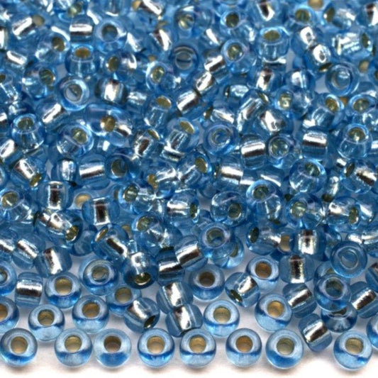 10/0 78132 Preciosa Cseh Üveg Magtartalmú Gyöngyök (Kásagyöngy) Rocailles 2.3mm. Kék 2 festett Kristály, Ezüst Béléssel.