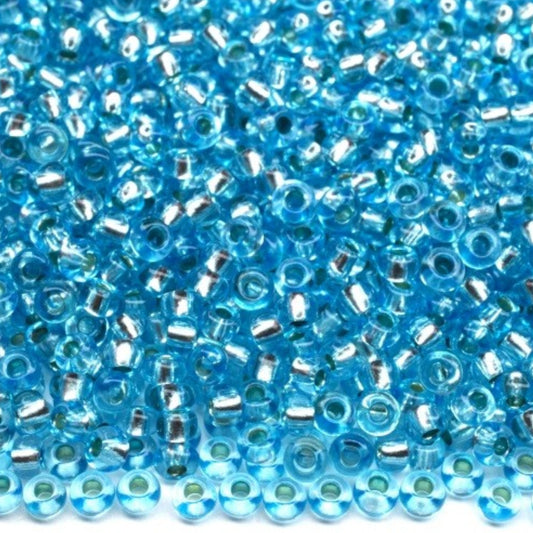 10/0 78134 Preciosa Cseh Üveg Magtartalmú Gyöngyök (Kásagyöngy) Rocailles 2.3mm. Kék 2 festett Kristály, Ezüst Béléssel.