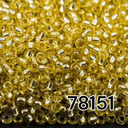10/0 78151 Preciosa Czech Glass Koraliki Rocailles 2.3mm. Zielono-żółte 2 barwione kryształowe, srebrne wykończenie.