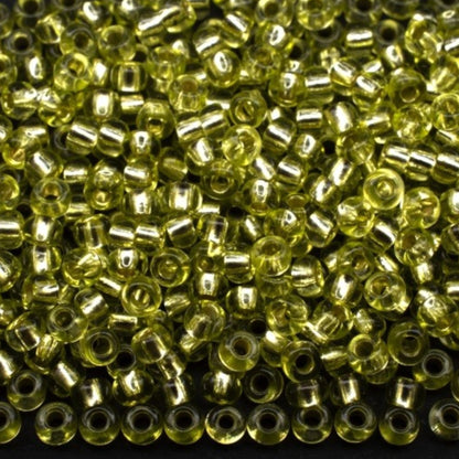 10/0 78153 Preciosa Tsjekkiske glass små perler Rocailleperler 2.3mm. Grønn 2 farget krystall, sølvbelagt.