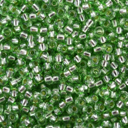 10/0 78161 Preciosa Czech Glass Seed Beads Rocailles 2.3mm. Green 2 dyed Crystal, Silver Lined.