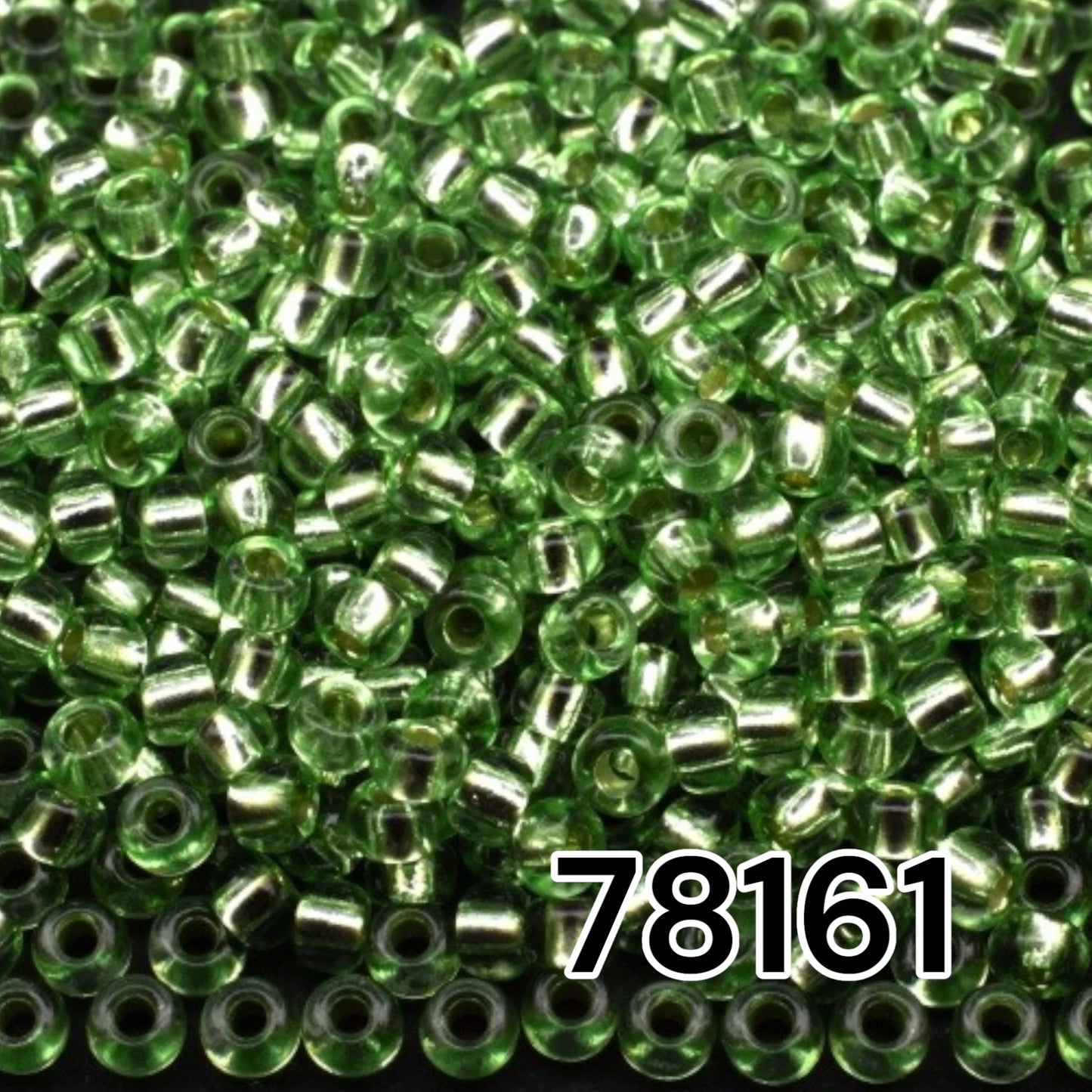 10/0 78161 Preciosa Czech Glass Seed Beads Rocailles 2.3mm. Green 2 dyed Crystal, Silver Lined.
