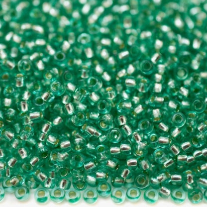 10/0 78164 Preciosa Czech Glass Seed Beads Rocailles 2.3mm. Green 2 dyed Crystal, Silver Lined.