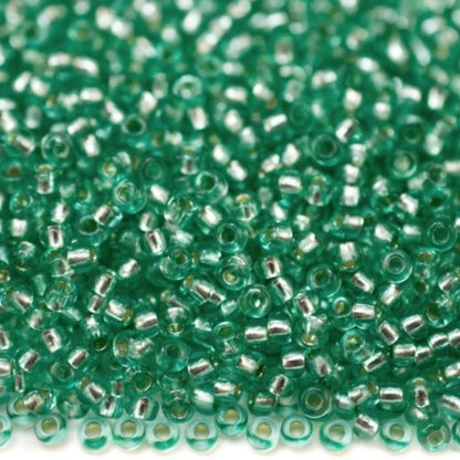 10/0 78164 Preciosa Czech Glass Seed Beads Rocailles 2.3mm. Green 2 dyed Crystal, Silver Lined.