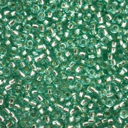 10/0 78164 Preciosa Czech Glass Seed Beads Rocailles 2.3mm. Green 2 dyed Crystal, Silver Lined.