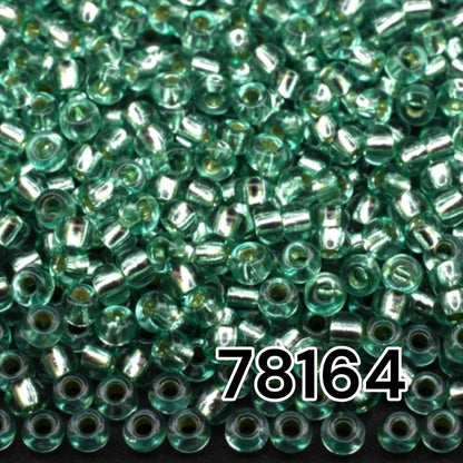 10/0 78164 Preciosa Czech Glass Seed Beads Rocailles 2.3mm. Green 2 dyed Crystal, Silver Lined.
