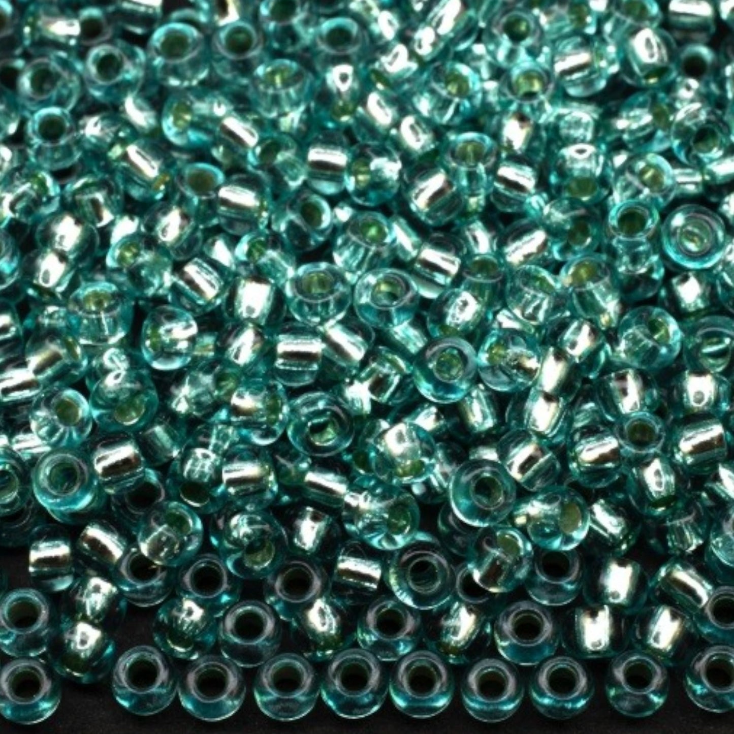 10/0 78165 Preciosa Τσέχικες Γυάλινες Χάντρες Ροκάιλ 2.3mm. Μπλε Πράσινο 2 βαμμένο Κρύσταλλο, Ασημένια Επένδυση.