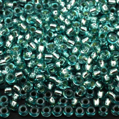 10/0 78165 Preciosa Τσέχικες Γυάλινες Χάντρες Ροκάιλ 2.3mm. Μπλε Πράσινο 2 βαμμένο Κρύσταλλο, Ασημένια Επένδυση.