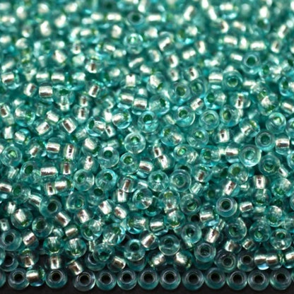 10/0 78165 Preciosa Τσέχικες Γυάλινες Χάντρες Ροκάιλ 2.3mm. Μπλε Πράσινο 2 βαμμένο Κρύσταλλο, Ασημένια Επένδυση.