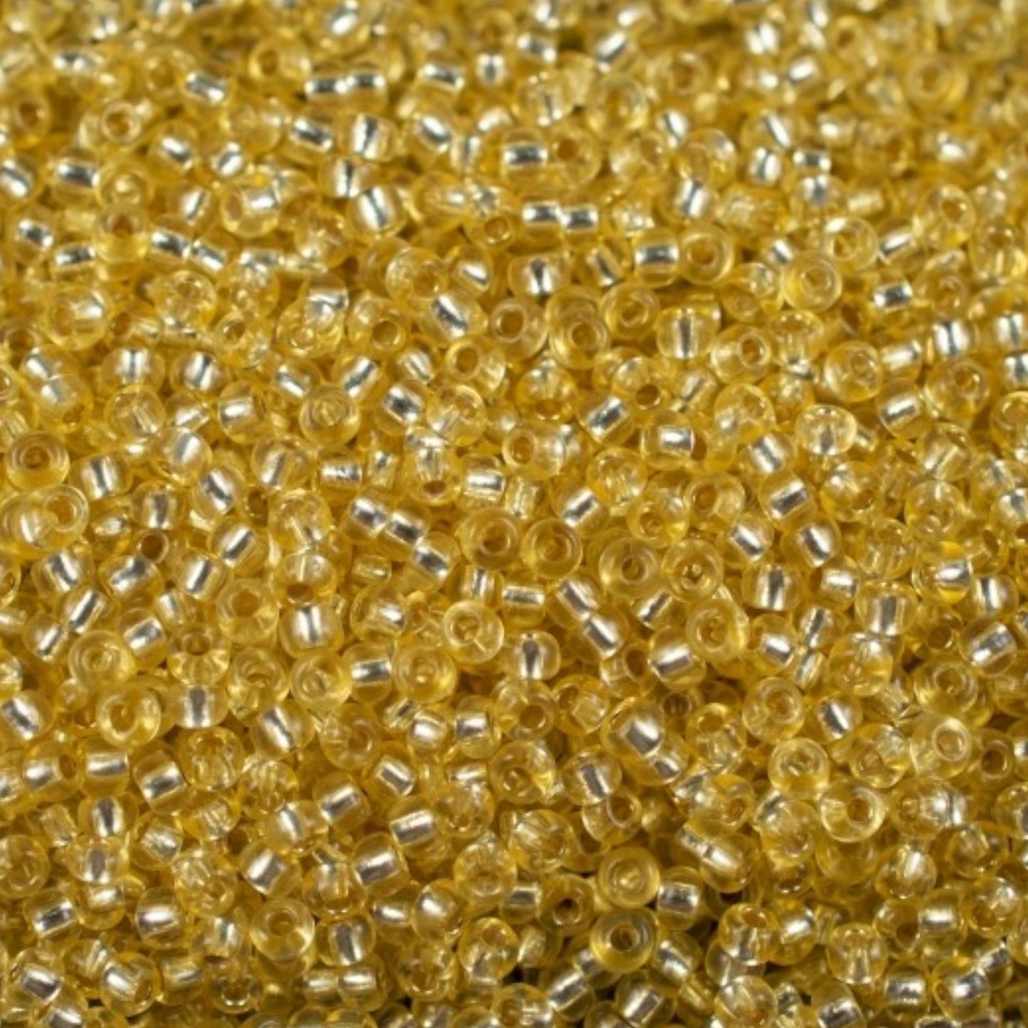 10/0 78181 Preciosa Чехски стъклени Малки Мъниста Рокайли 2.3mm. Жълт 2 боядисан Кристал, Сребристо покритие.