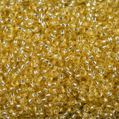 10/0 78181 Preciosa Чехски стъклени Малки Мъниста Рокайли 2.3mm. Жълт 2 боядисан Кристал, Сребристо покритие.