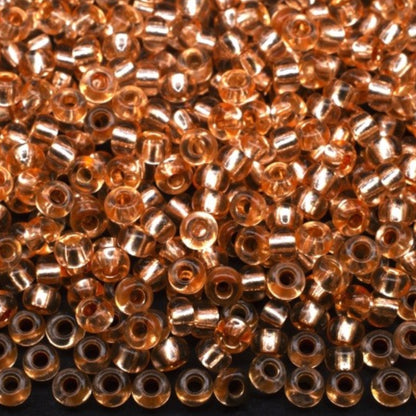 10/0 78184 Preciosa Czech Glass Seed Beads Rocailles 2.3mm. Orange 2 dyed Crystal, Silver Lined.
