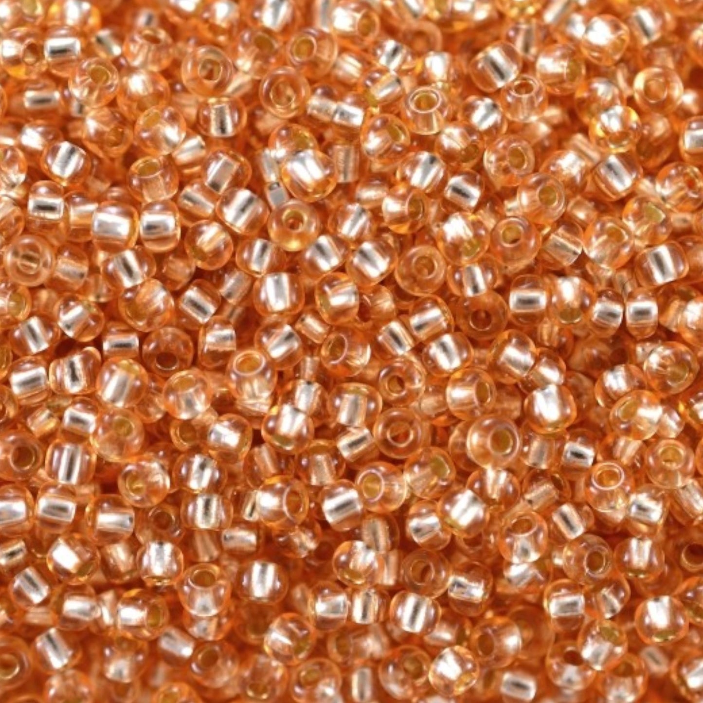 10/0 78184 Preciosa Czech Glass Seed Beads Rocailles 2.3mm. Orange 2 dyed Crystal, Silver Lined.