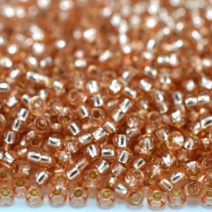 10/0 78185 Preciosa Czech Glass Perler Rocailles 2.3mm. Orange 2 farvet Krystal, Sølvbelagt.