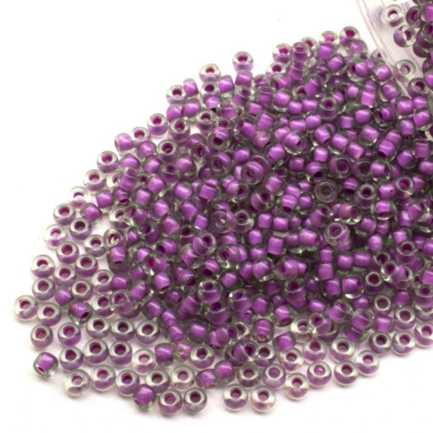 10/0 80628 Preciosa Seed Beads. Crystal Terra Color Lined.