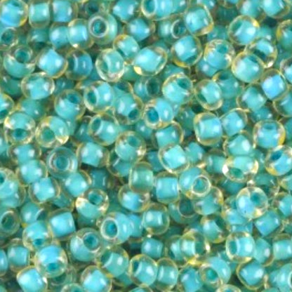 10/0 80836 Preciosa Cseh Üveg Magtartalmú Gyöngyök (Kásagyöngy) Rocailles 2.3mm. Zöld Kristály Terra Kék Szegélyezett.