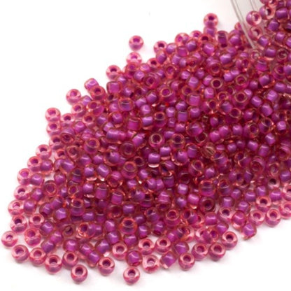 10/0 80928 Preciosa Seed Beads. Crystal Terra Color Lined.