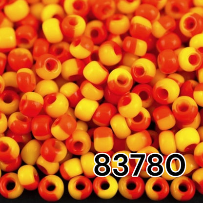 6/0 83780 Preciosa Czech Glass Koraliki Rocailles 4.1mm. Żółto-pomarańczowy harlekin.