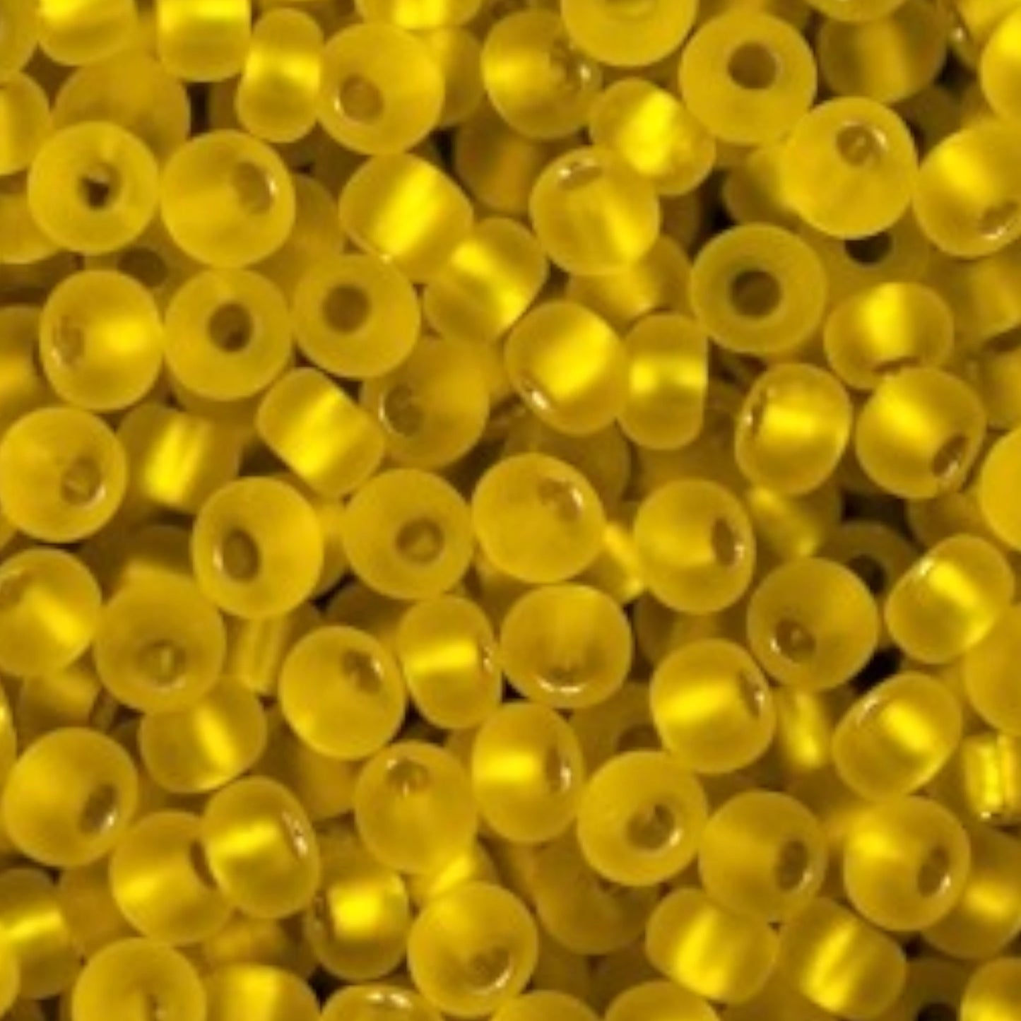 10/0 87010matte Preciosa Seed Beads. Yellow transparent Silver lined.