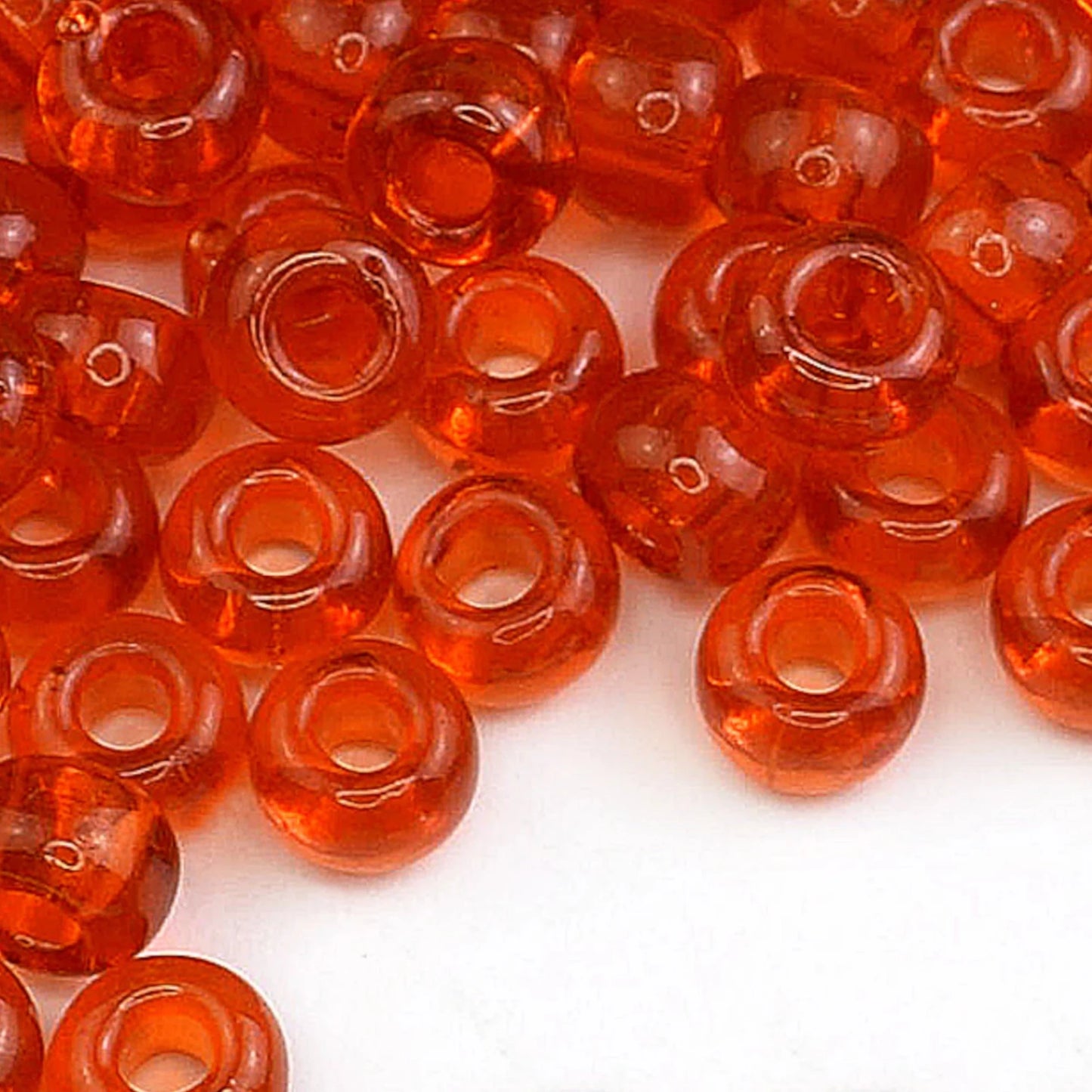 2/0 90030 Preciosa Čekiško Stiklo Karoliukai Rokajaus 6.1mm. Oranžinė Skaidri Natūrali.