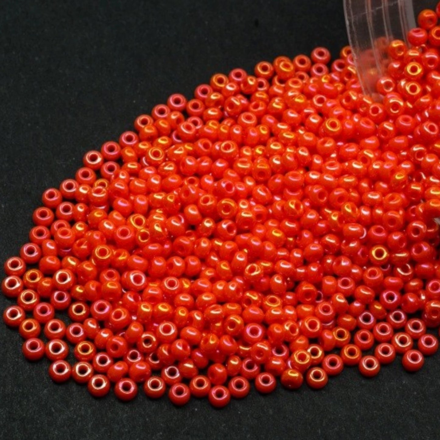 10/0 94140 Preciosa Seed Beads. Opaque rainbow orange.