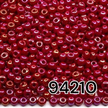 10/0 94210 Preciosa Seed Beads. Opaque rainbow red.