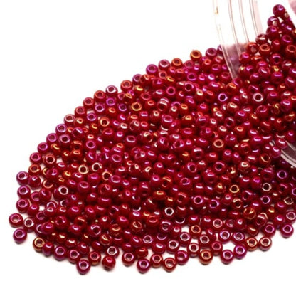 10/0 94210 Preciosa Seed Beads. Opaque rainbow red.