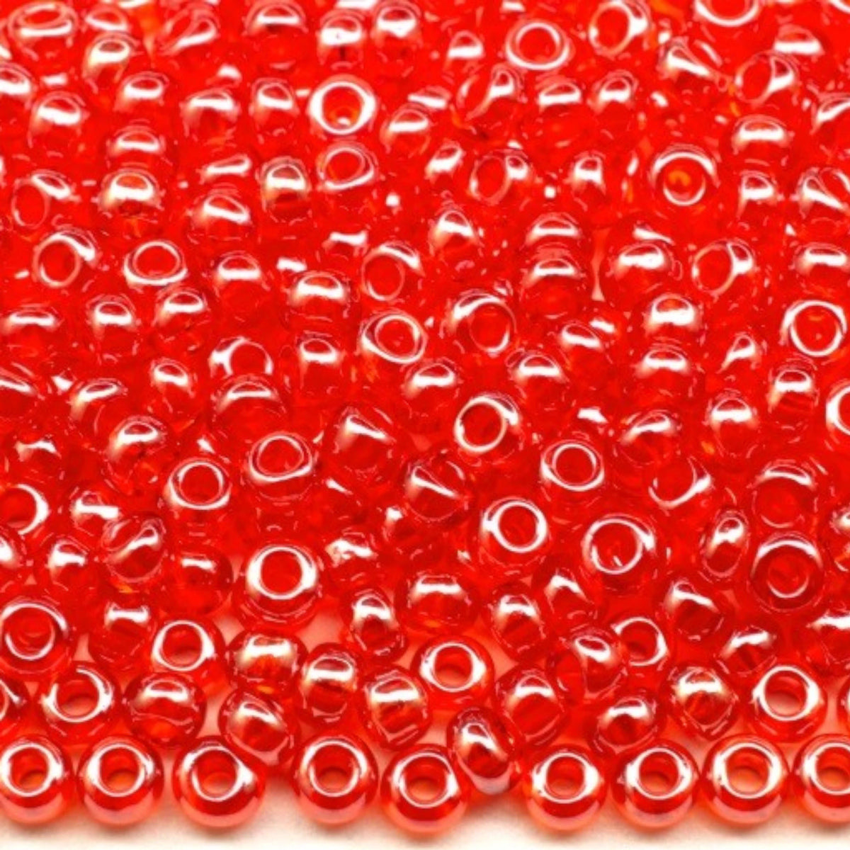 10/0 96050 Perles en verre tchèques Preciosa de Rocaille 2.3mm. Rouge transparent Sfinx.