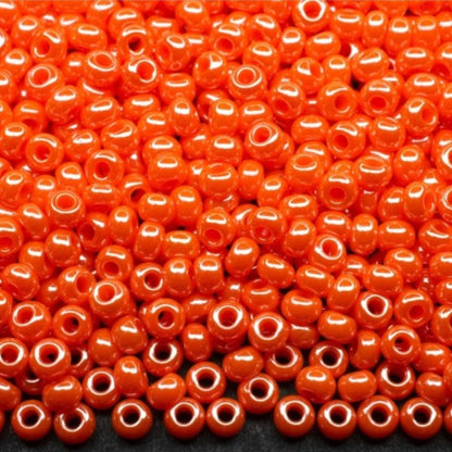 10/0 98140 Preciosa Seed Beads. Opaque Sfinx orange.