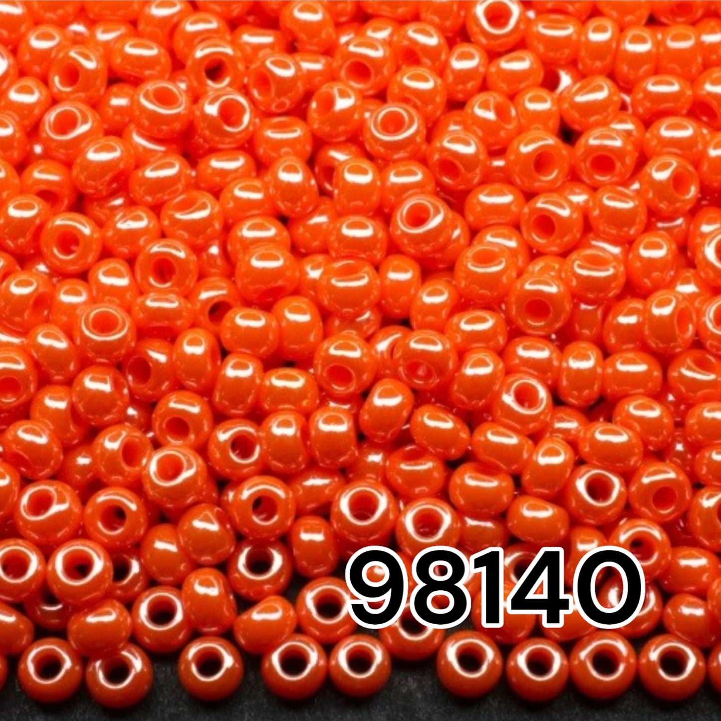 10/0 98140 Preciosa Seed Beads. Opaque Sfinx orange.