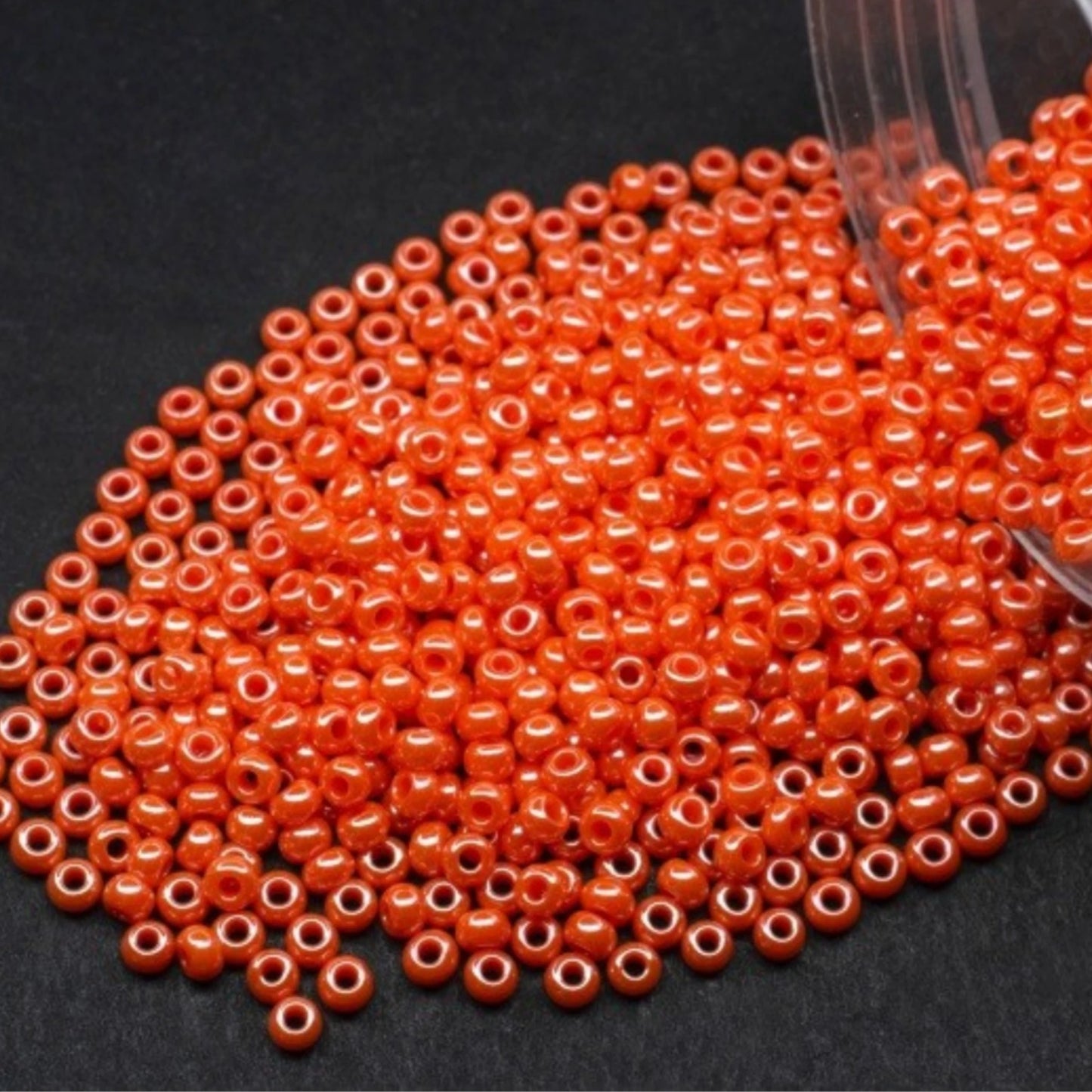 10/0 98140 Preciosa Seed Beads. Opaque Sfinx orange.