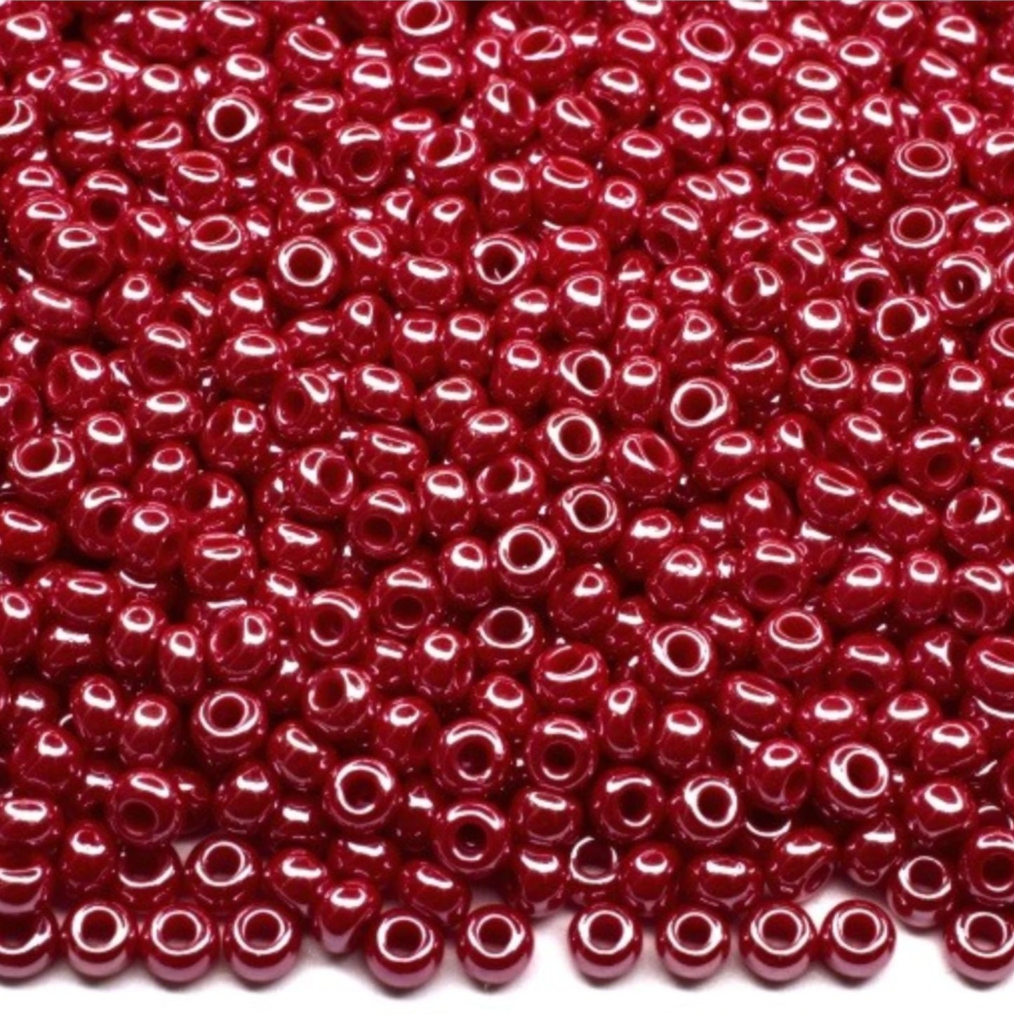 10/0 98190 Preciosa Seed Beads. Opaque Sfinx red.