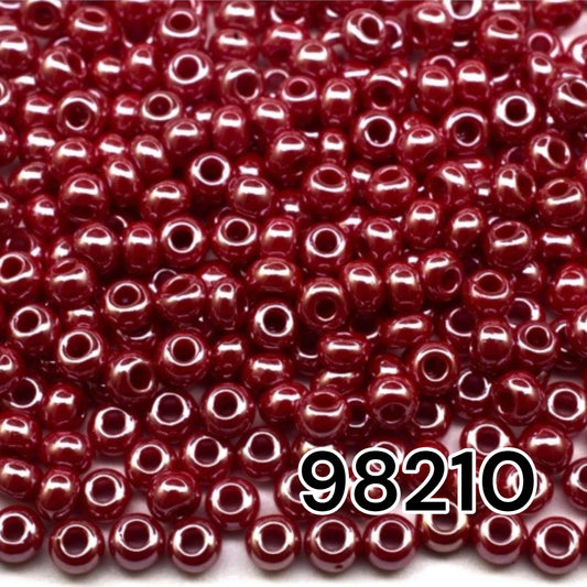 10/0 98210 Preciosa Seed Beads. Opaque Sfinx red.