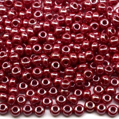 10/0 98210 Preciosa Seed Beads. Opaque Sfinx red.