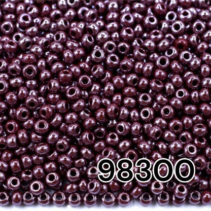 10/0 98300 Preciosa Seed Beads. Opaque Sfinx red brown.