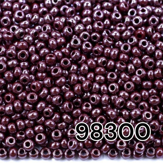 10/0 98300 Preciosa Seed Beads. Opaque Sfinx red brown.