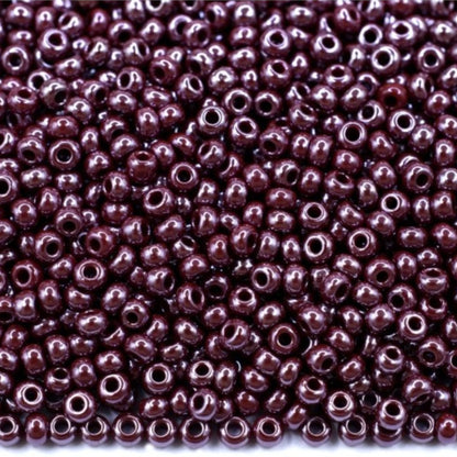 10/0 98300 Preciosa Seed Beads. Opaque Sfinx red brown.