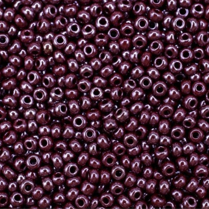 10/0 98300 Preciosa Seed Beads. Opaque Sfinx red brown.